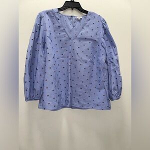 Cremiux with dramatic sleeves